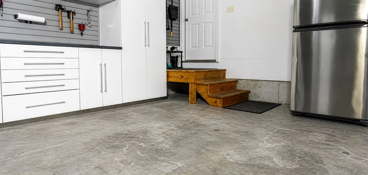 Bare concrete in a garage.